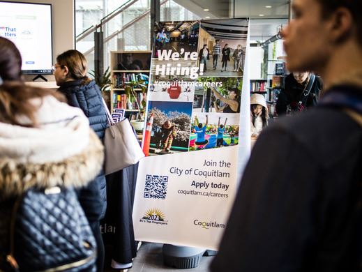 "We're hiring!" sign at City of Coquitlam job fair