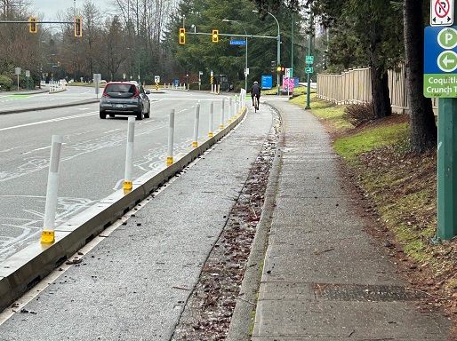Protected bike lane leading up to intersection
