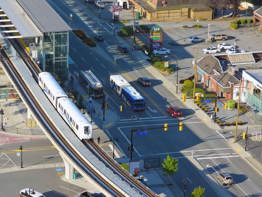 Aerial view of SkyTrain and buses in Coquitlam.