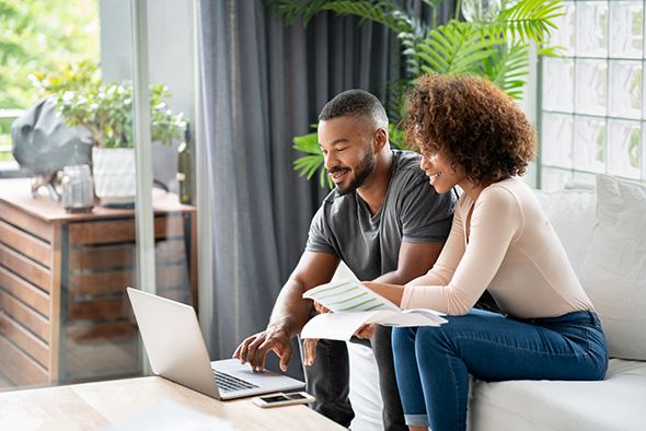 Couple paying bill online