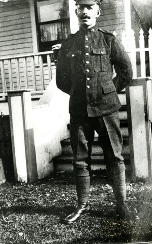 Alexander Windram in uniform in front of 902 Brunette Street (City of Coquitlam Archives, C6.160)